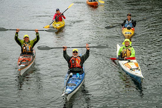 happy kayakers people fund great lakes energy